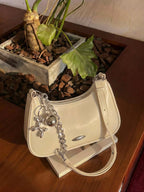 Off-white mini shoulder bag with a chain strap