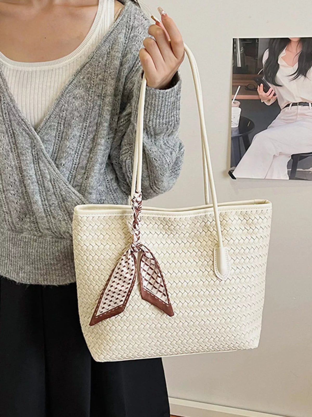 Beige woven shoulder bag with long straps